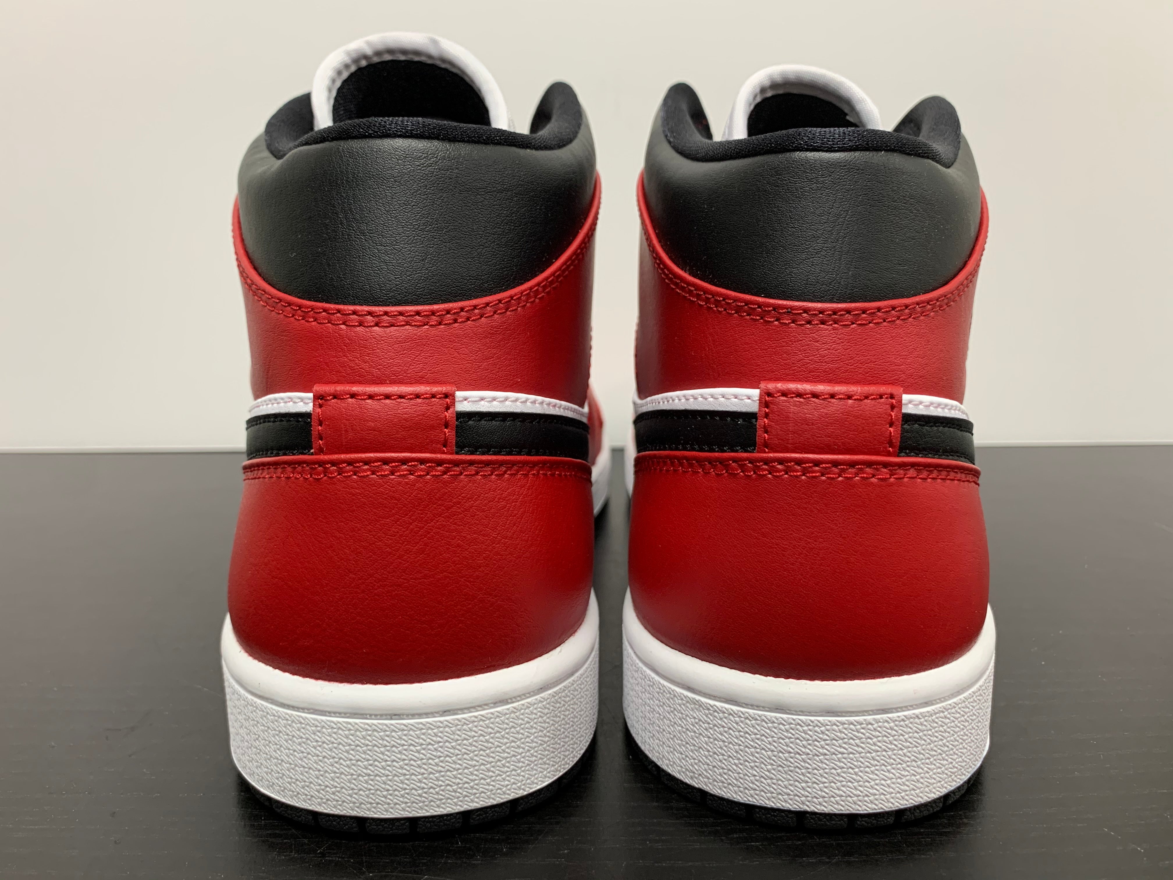 j1 mid chicago black toe price